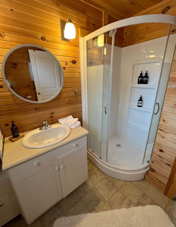 Shower bathroom washroom toiletries pine vanity mirror cabin cottage nl
