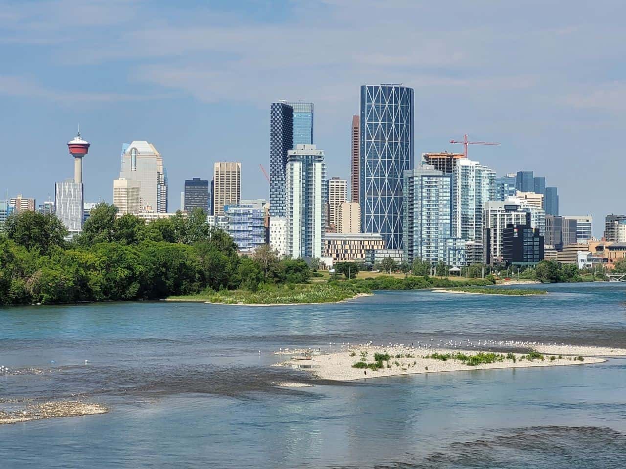 The urban pathways of Calgary Alberta, which are part of the 28,000 km long Trans Canada Trail, offer hikers, joggers, and cyclists beautiful views of the city's skyline.