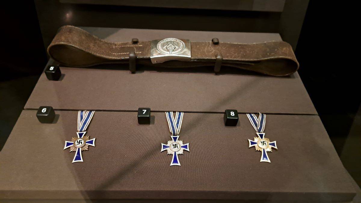 Medals given out to German women for having lots of kids during Nazi Germany on display at the Human Rights Museum in Canada.