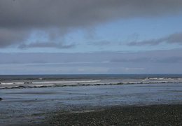 Rolling Waves (679 visits) Walking the sandy beach under blue and storming clouds Rolling Waves