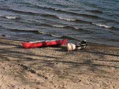Beached canoes on Okanagan Lake Water sports in Peachland canoe2008 001.jpg