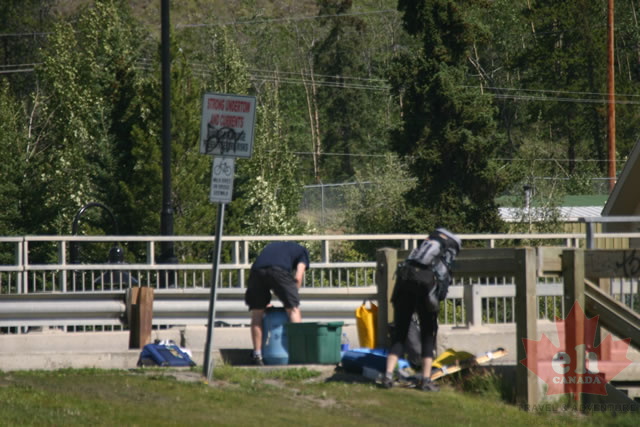 Preparing to Launch (2218 visits) Couple set to launch canoe at Yukon River put-in in Whitehorse Preparing to Launch