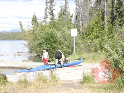 Gearing Up (2783 visits) Kayakers prepare to paddle Pine Lake in Haines Junction Gearing Up