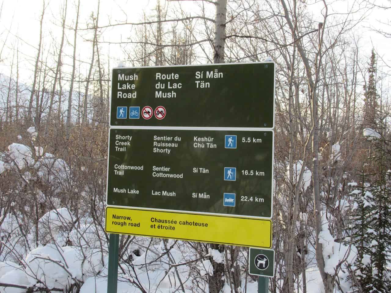 Trail sign for Mush Lake Road.