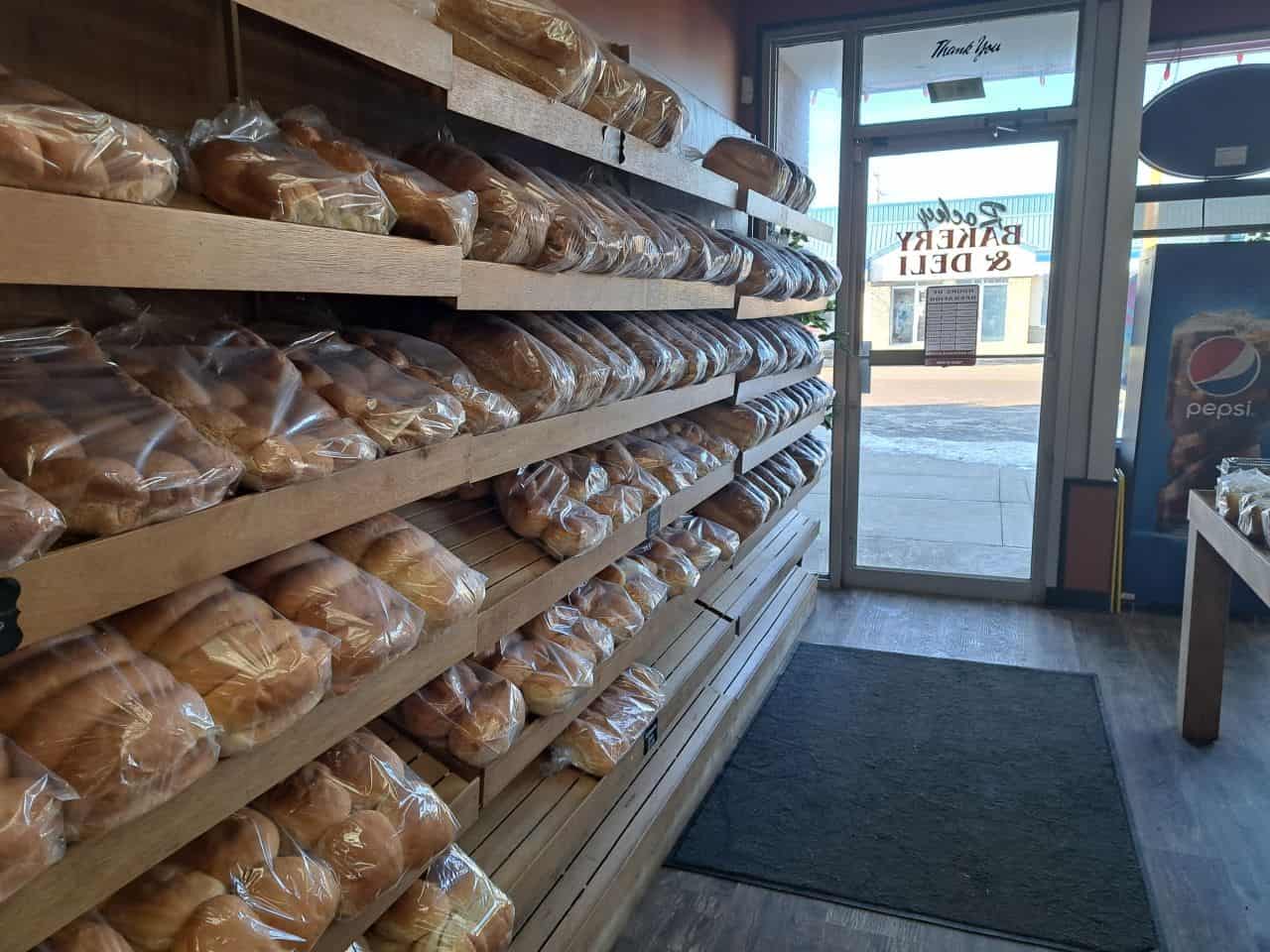 A wall of fresh baked bread at a local bakery in Rocky Mountain House Alberta Canada