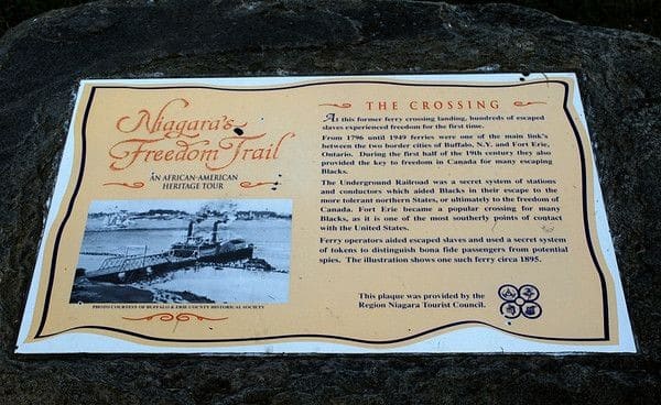 Historic plaque on Niagara's Freedom Trail marking The Crossing, where former slaves crossed the Niagara River into Upper Canada