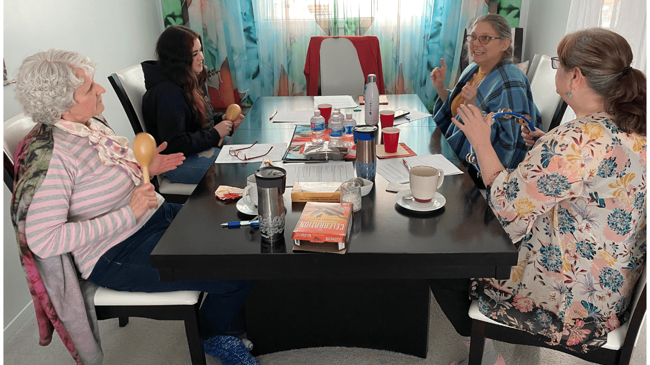 Women's Art Retreat in Tumbler Ridge - Image of four women with music instruments playing in unison.