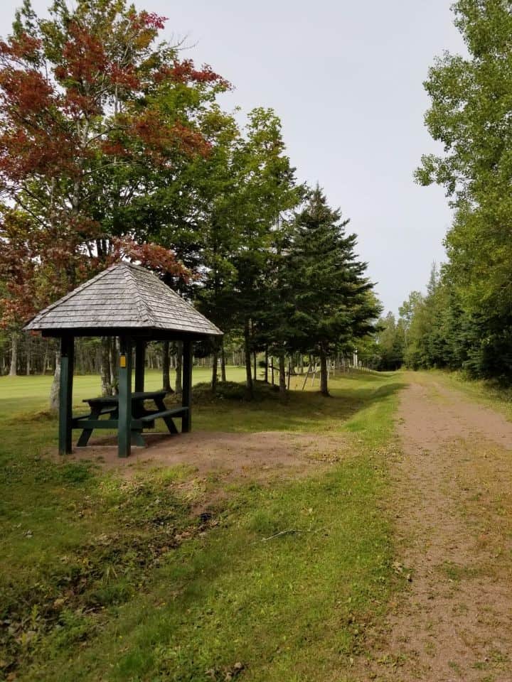 Covered picnic shelters provide rest areas for hikers and cyclists on the Confederation Trail, PEI