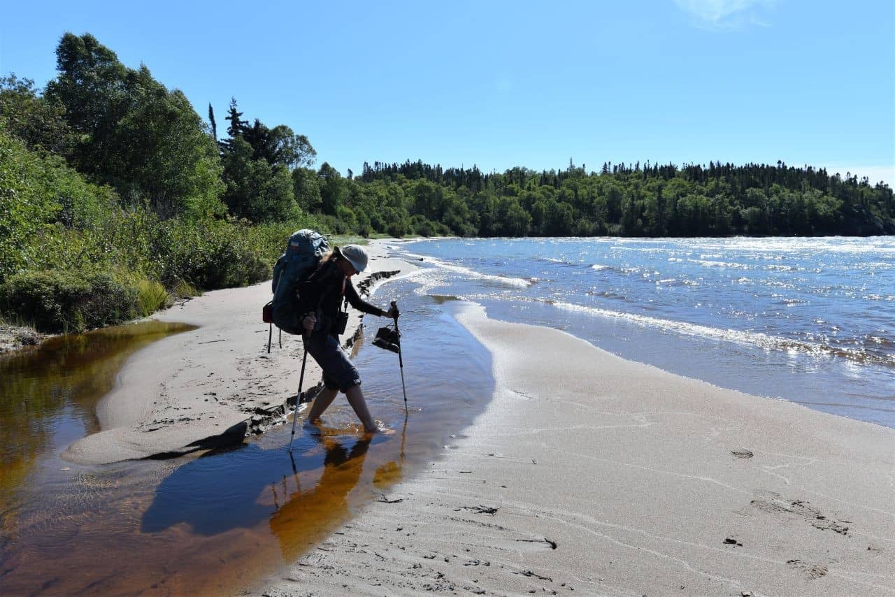 Hikers on the Casque Isles Trail trace the rocky shore and trek sandy beaches on the north shore of Lake Superior between Rossport and Terrace Bay, Ontario