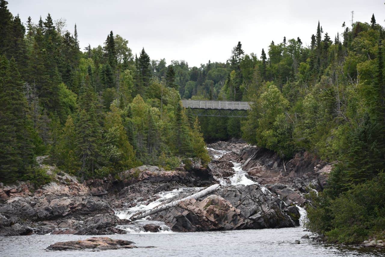 Bridges take thru-hikers over waterfalls, rivers, and rapids on the rugged Casque Isles footpath along the north shore of Lake Superior