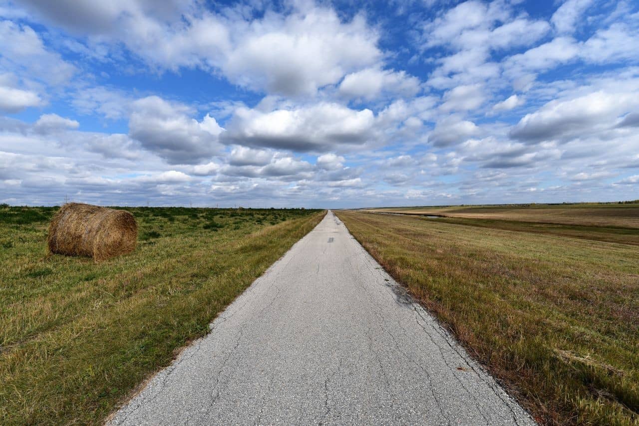The Duff Roblin Parkway Trail is a flat, partially paved trail perfect for cycling and hiking while enjoying the wide open prairie landscapes of Manitoba, Canada