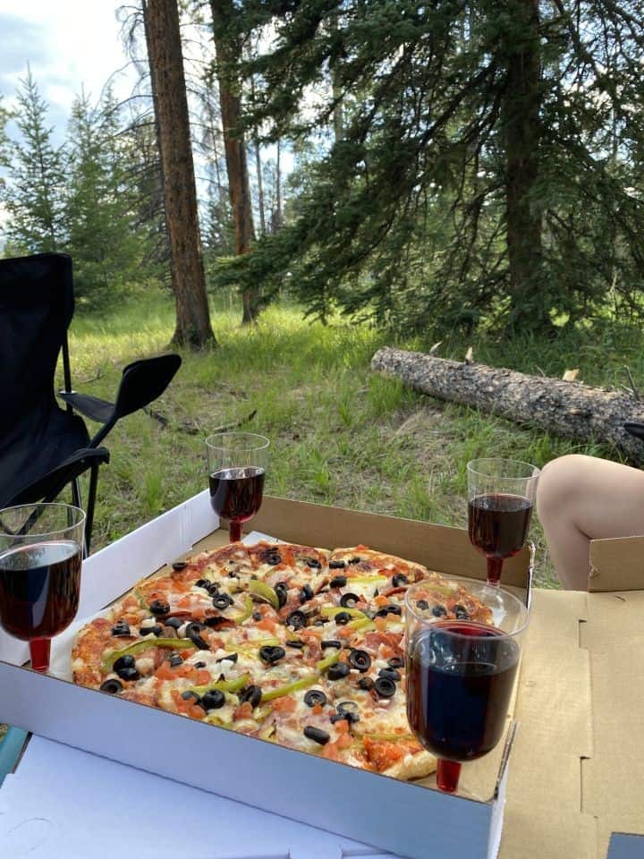 Aarvark pizza delivered to Tunnel Mountain Campground in Banff is the perfect celebration dinner for riding EFI on our cycling from Jasper to Banff on the Icefields Parkway adventure.