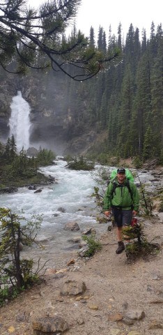 Stopping to enjoy the view at laughing Falls along the Yoho Valley Trail in BC Canada.