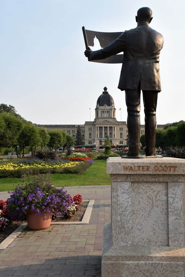 Statue of Walter Scott, first premier of Saskatchewan, stands outside the Legislative Buildings on the Wascana Center Trail in Regina, Saskatchewan, Canada.