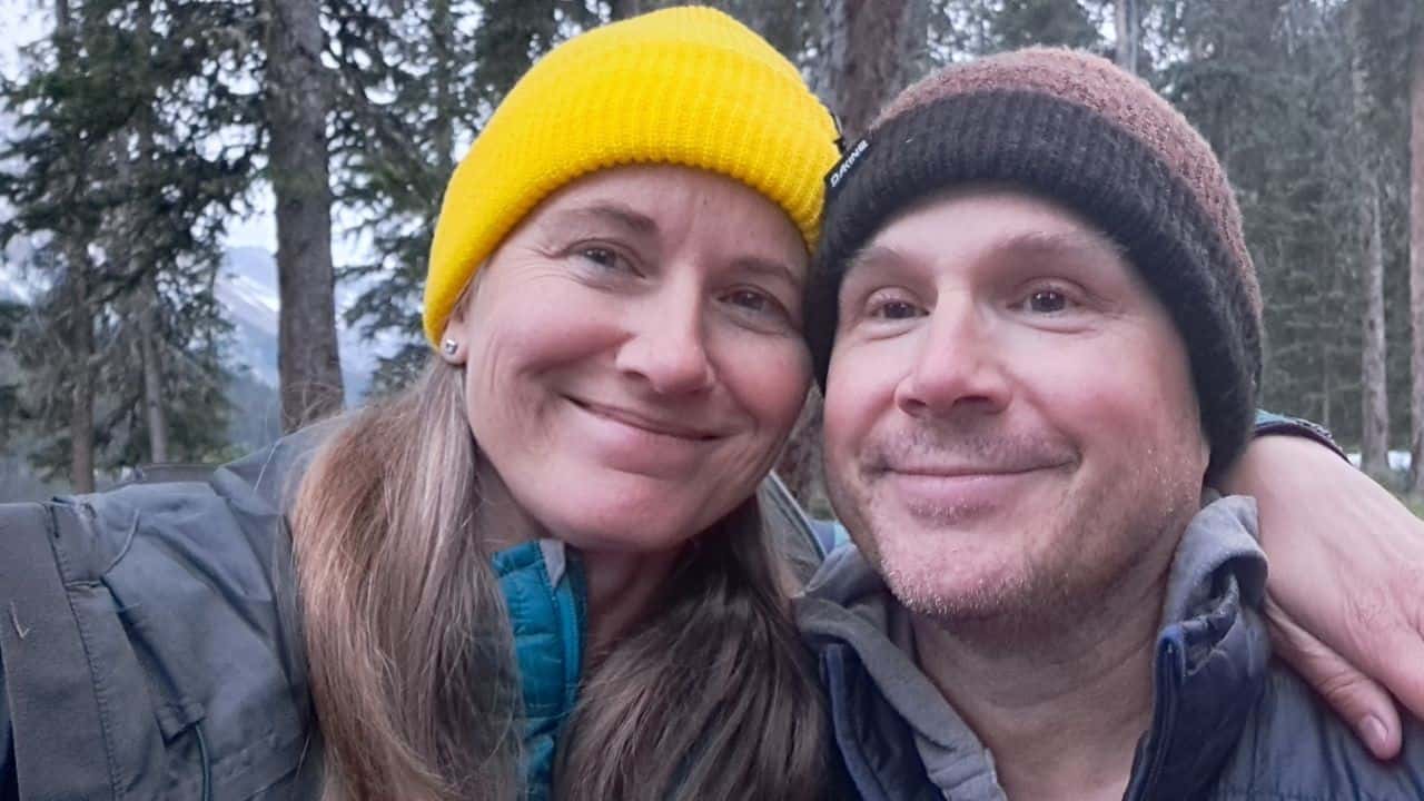 A selfie of two campers that are happy to be spending time in Jasper's backcountry