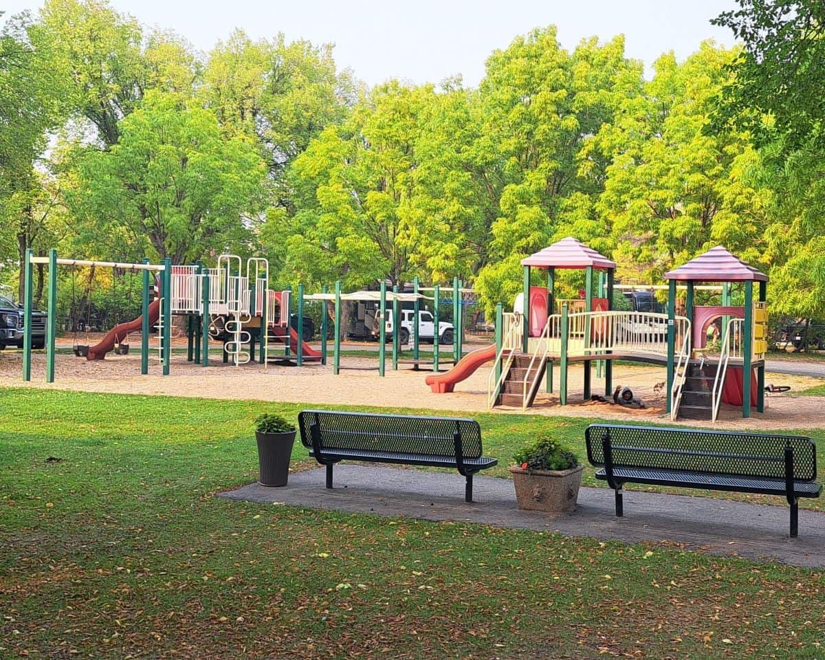 A large playground with areas y=for older and younger children to play in at the Gordon Howe Campground