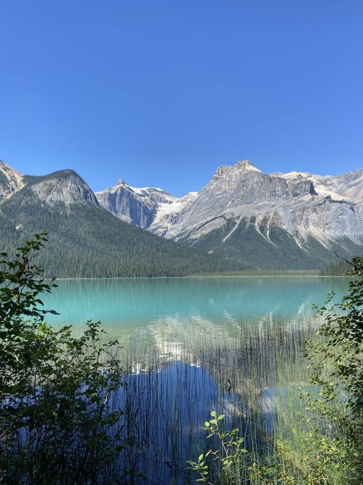 Rocky Mountain sightseeing self guided views of Emerald Lake in Yoho National Park in British Columbia Canada.