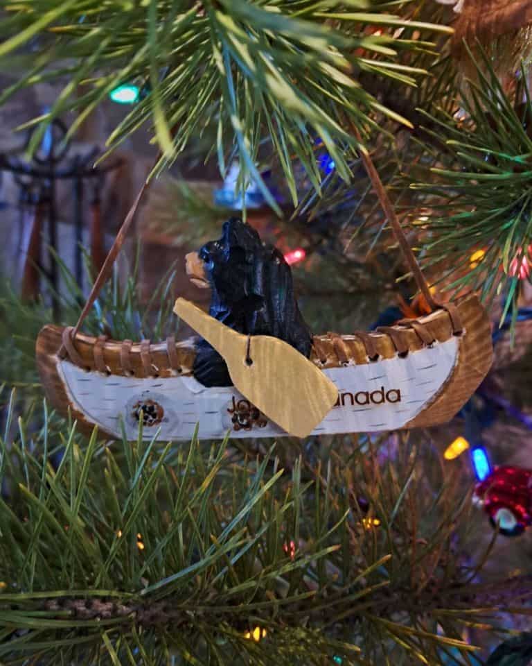 A wooden canoe Christmas ornament is a keepsake to remember our Maligne Lake Backcountry Canoe Camping Trip by.
