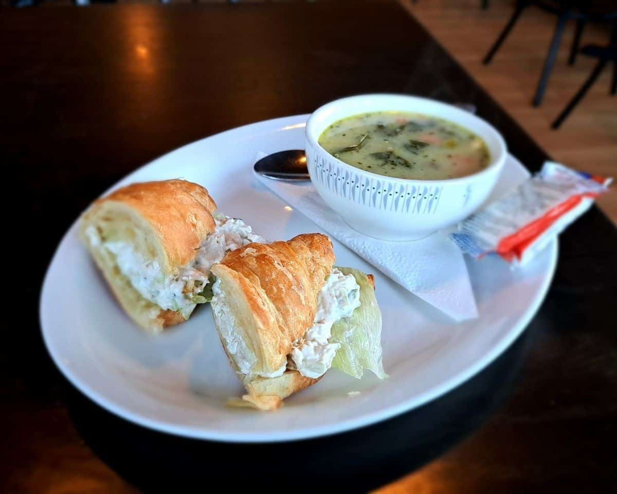 Homemade chicken coconut soup and a chicken salad croissant make a hearty lunch at Java and Gems Get Stuffed restaurant in Gainford Alberta Canada