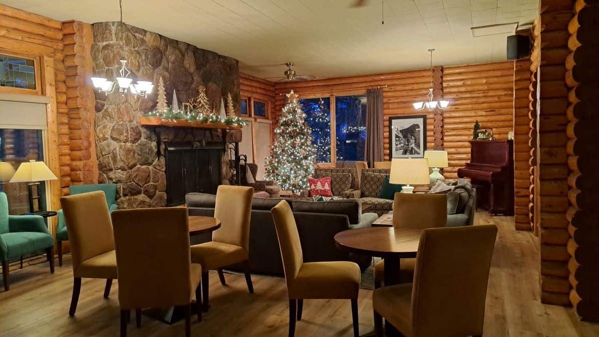 Cozy up by the fire and enjoy a drink and a snack at the Fireside Lounge in Overlander Mountain Lodge.