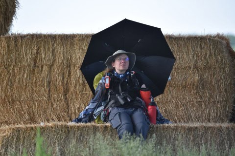 Walking with water bottles and sun umbrellas, we navigate the exposed sections of the Crow Wing Trail. Thoughtful gear choices make long prairie stretches comfortable and safe on this Canadian Camino pilgrimage.