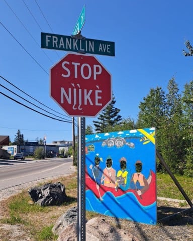 Billingual English Dene Stop Sign is part of the Yellowknife Northwest Territories Travel Guide.