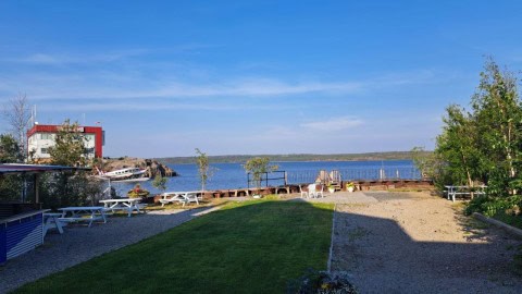 The patio at Flame Craft Grill'n Chill in Yellowknife overlooks Great Slave Lake and Air Tindi Float Base in Old Town.