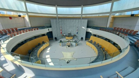 The round Legislative Assembey of the Northwest Terrtitories incorporates a number of traditional First Nations beliefs and practices. The centre of the room is adorned with a polar bear rug.