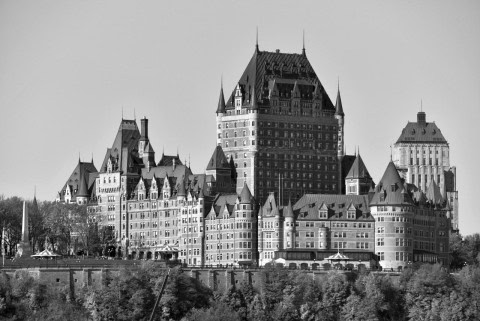 The grand Fairmont Château Frontenac in Quebec City is not only a landmark but also a hotbed of ghostly encounters, including the apparition of a woman in a flowing white gown.