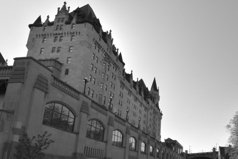 At the Fairmont Château Laurier, the ghost of Charles Melville Hays roams, overseeing his unfinished project from beyond the grave, adding a supernatural twist to this luxury hotel.