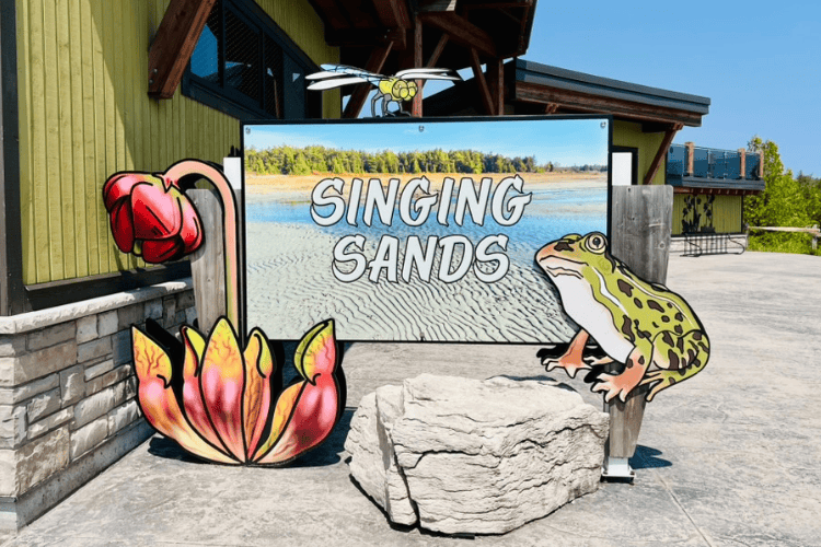 A colourful sign with the words 