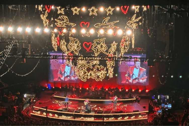 Mumford and Sons on stage at the Bell Centre in Montreal. Featuring a dramatic lighting display.
