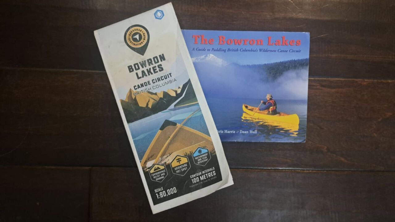 Trip essentials, a Backroad Maps Bowron Lakes Canoe Circuit paper map and Chri Harris' The Bowron Lakes Guide Book.
