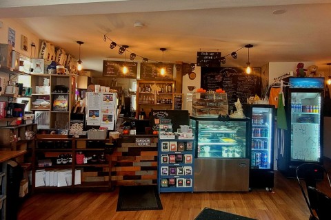 Warm and inviting interior of The Battery Café in St. John’s, Newfoundland, showcasing cozy décor, nautical-inspired charm, and freshly brewed coffee — the perfect atmosphere to relax before or after exploring North Head Trail.