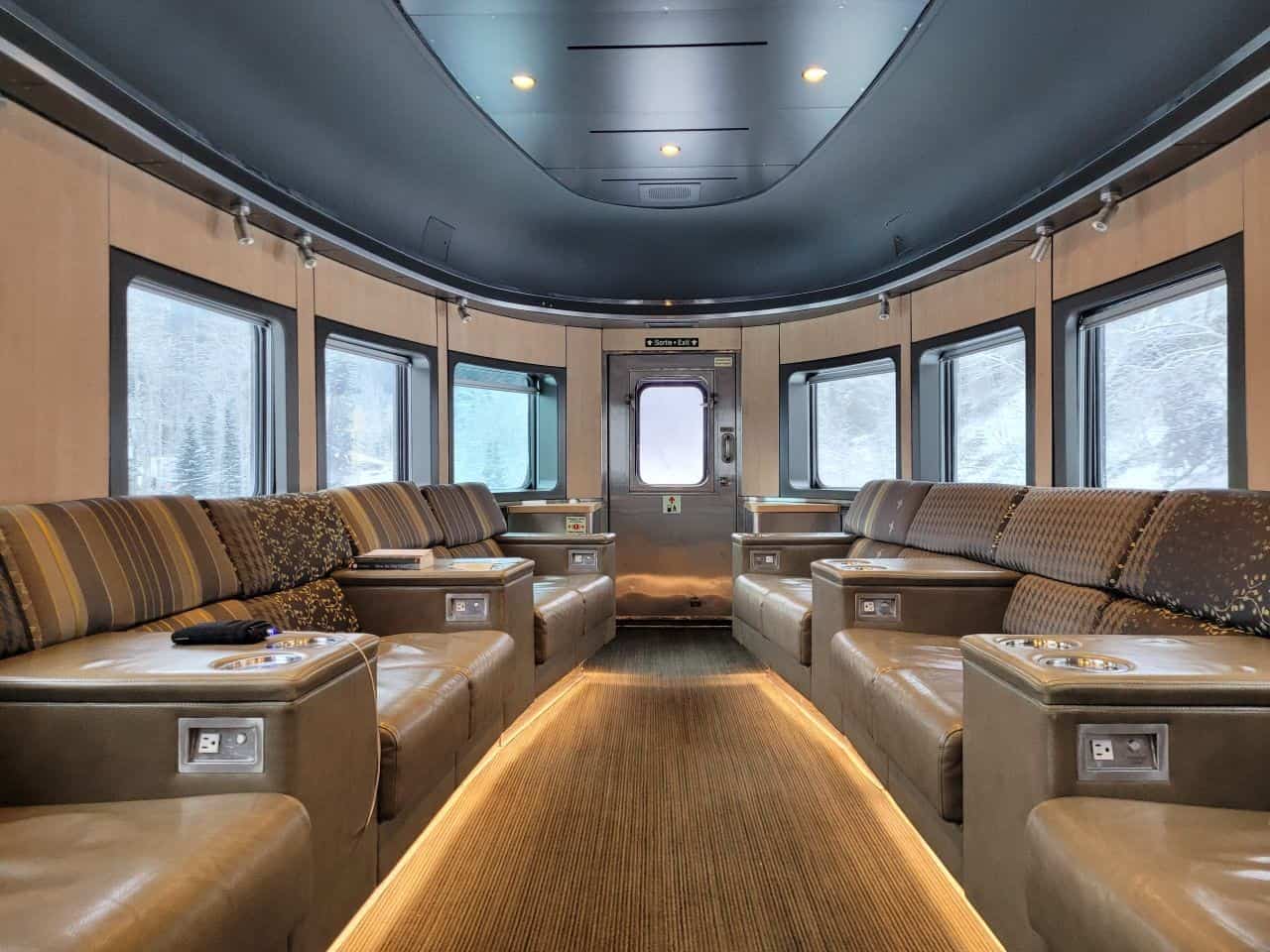 Passengers enjoy freshly prepared meals in the dining car aboard VIA Rail’s The Canadian, where warm service, scenic views, and winter landscapes combine to create a memorable transcontinental train journey.