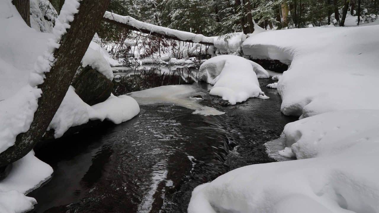 Ice And Snow Captures The Imagination Below Potts Falls in Bracebridge