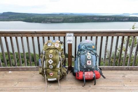 Pausing at a scenic overlook on the Trans Canada Trail, hikers experience Canada’s diverse landscapes, the sense of adventure, and the reflection moments that make long-distance thru-hiking across the Great Trail unforgettable.
