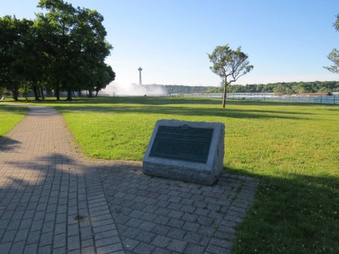 View along the Niagara River Recreational Trail heading toward Niagara Falls in Ontario, Canada, featuring paved pathways, river scenery, and a popular route for hikers and cyclists exploring the Niagara Parkway.