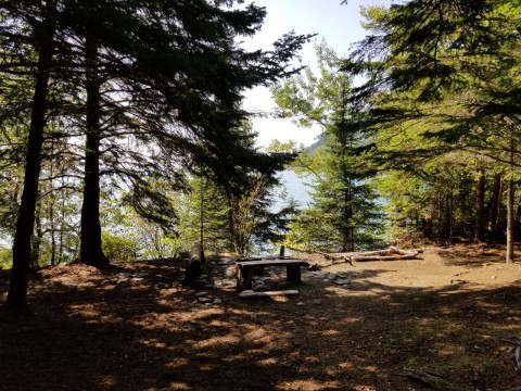 Backcountry campsite along Lake Superior on the Kabeyun Trail in Sleeping Giant Provincial Park near Thunder Bay, highlighting designated camping areas and remote overnight hiking experiences in Northern Ontario.