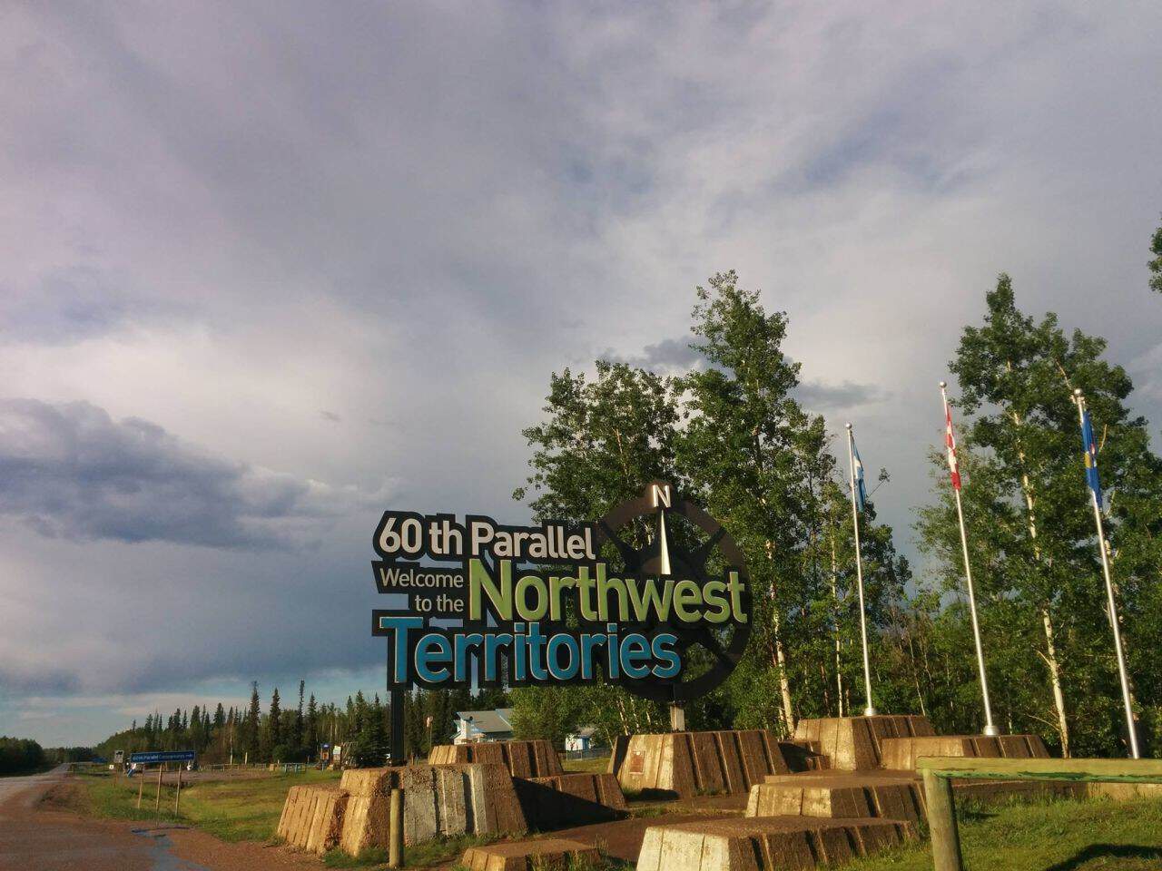 Northwest Territories welcome sign is large and beautiful just north of Indian Cabins, Alberta.