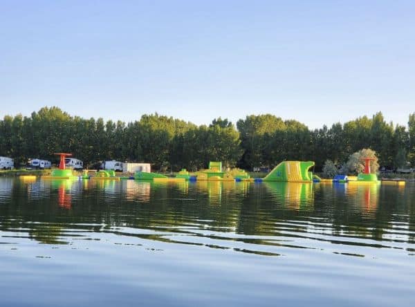 Rattlesnake Lake offers a fun inflatable water course. Found by accessing Golden Sheaf Park near Medicine Hat Alberta Canada