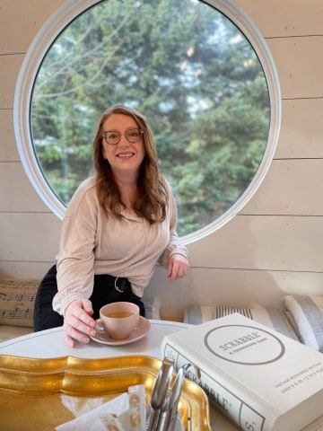 Having a sip of tea at A Little Cup of Sea in Newfoundland Canada is a great choice for a road trip.