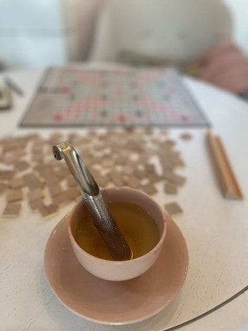 Playing games and sipping tea at our Newfoundland attraction called A Little Cup of Sea.