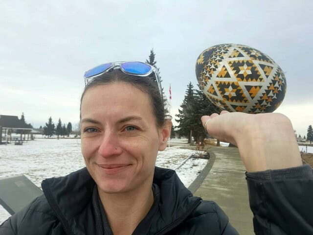 holding-the-pysanka-in-vegerville-ab