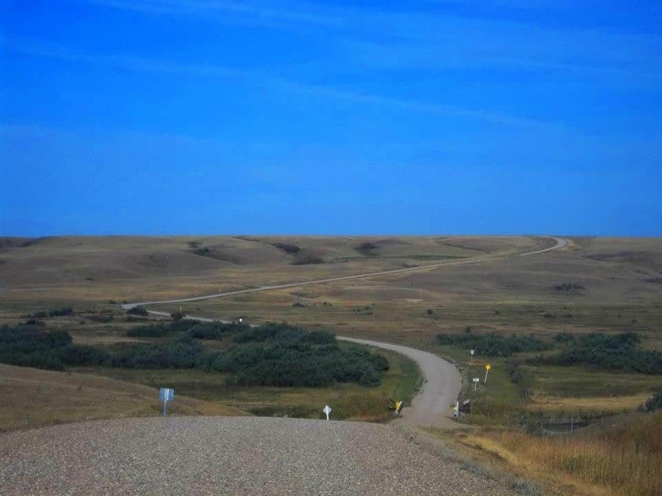 Rolling hills on the Backroads of Saskatchewan 2024-03-21 - Saskatchewan is not flat. The southern part has lots of rolling hills with lots of small towns to explore on the Backroads of Saskatchewan.