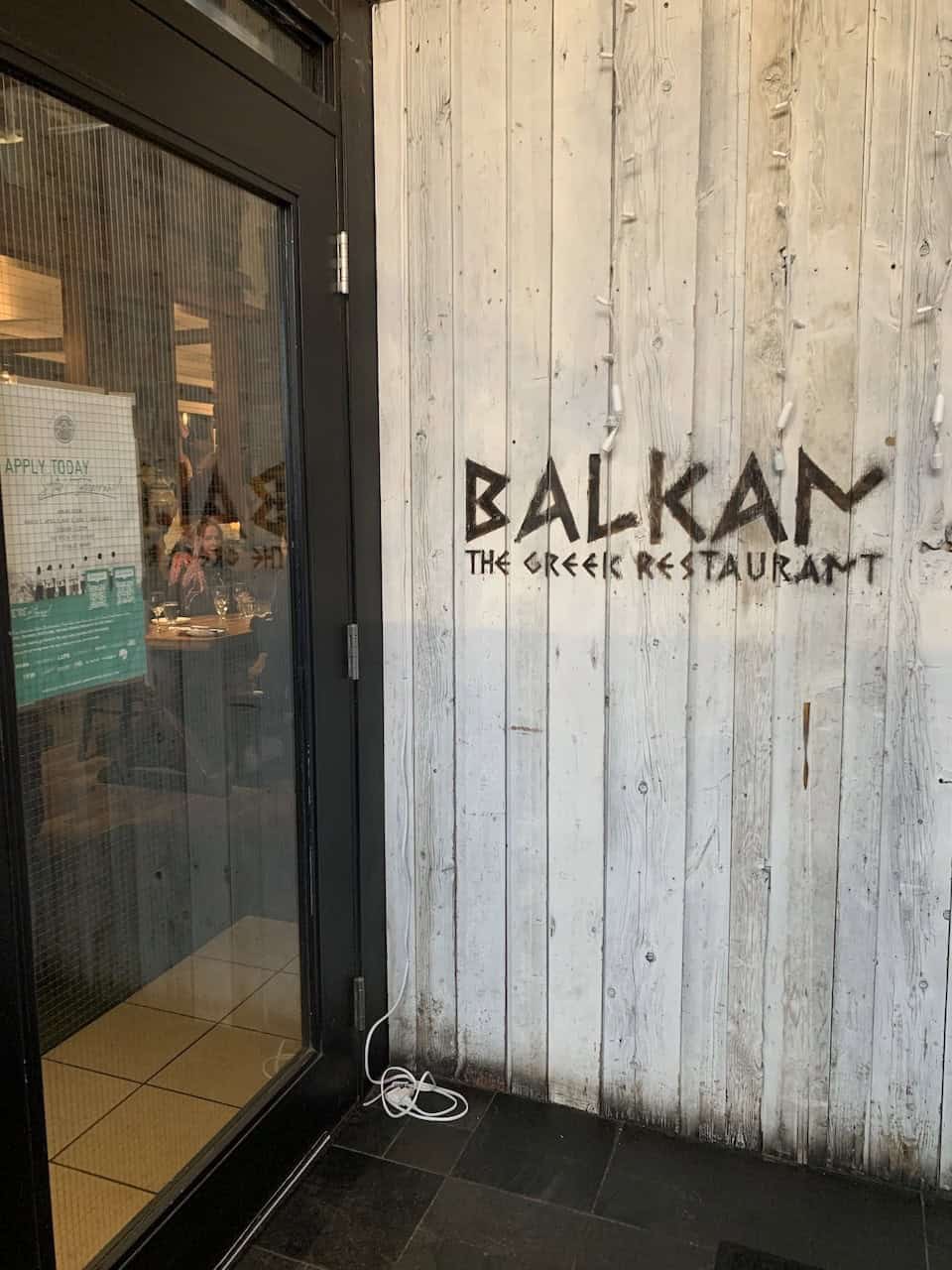 Balkan The Greek Restaurant Entrance - Another set of doors to Balkan The Greek Restaurant helps to keep the cold draft out of the main dining room in Banff, Alberta, Canada.