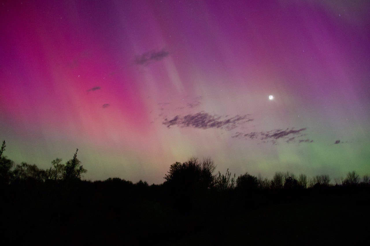 Aurora Borealis in Ontario Canada  - We were able to catch a glimpse of the moon while watching the Northern Lights in Clinton, Ontario, Canada. Photo Credit: Brent Ferrie