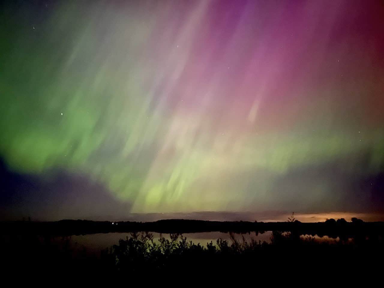 Northern Lights Over the Water in Ontario Canada - The view of the northern lights over the water at Hullett Provincial Wildlife Park in Clinton, Ontario was so beautiful. Photo Credit: Brent Ferrie