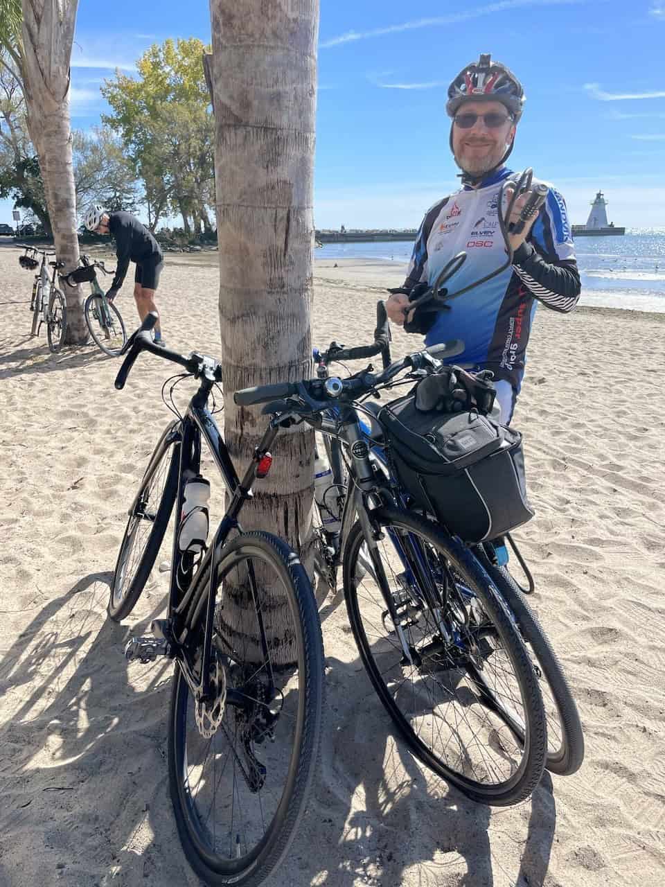 Locking-our-Bikes-to-Palm-Trees-Outside-the-Beach-House - It is not often that we lock our bicycles up to palm trees on the beach. I am told that they take the palm trees out each winter and re