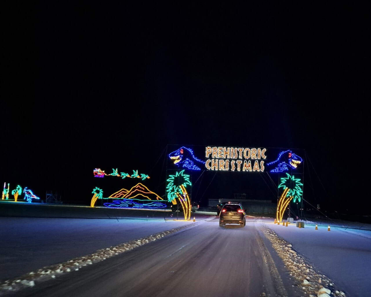 A Prehistoric Christmas at the Magic of Lights - Canadian Tire Magic of Lights Edmonton
The Prehistoric Christmas scene celebrates Alberta’s dinosaur heritage, blending giant prehistoric creatures with holiday lights. It’s a fun, unexpected moment that sparks laughter and amazement.
